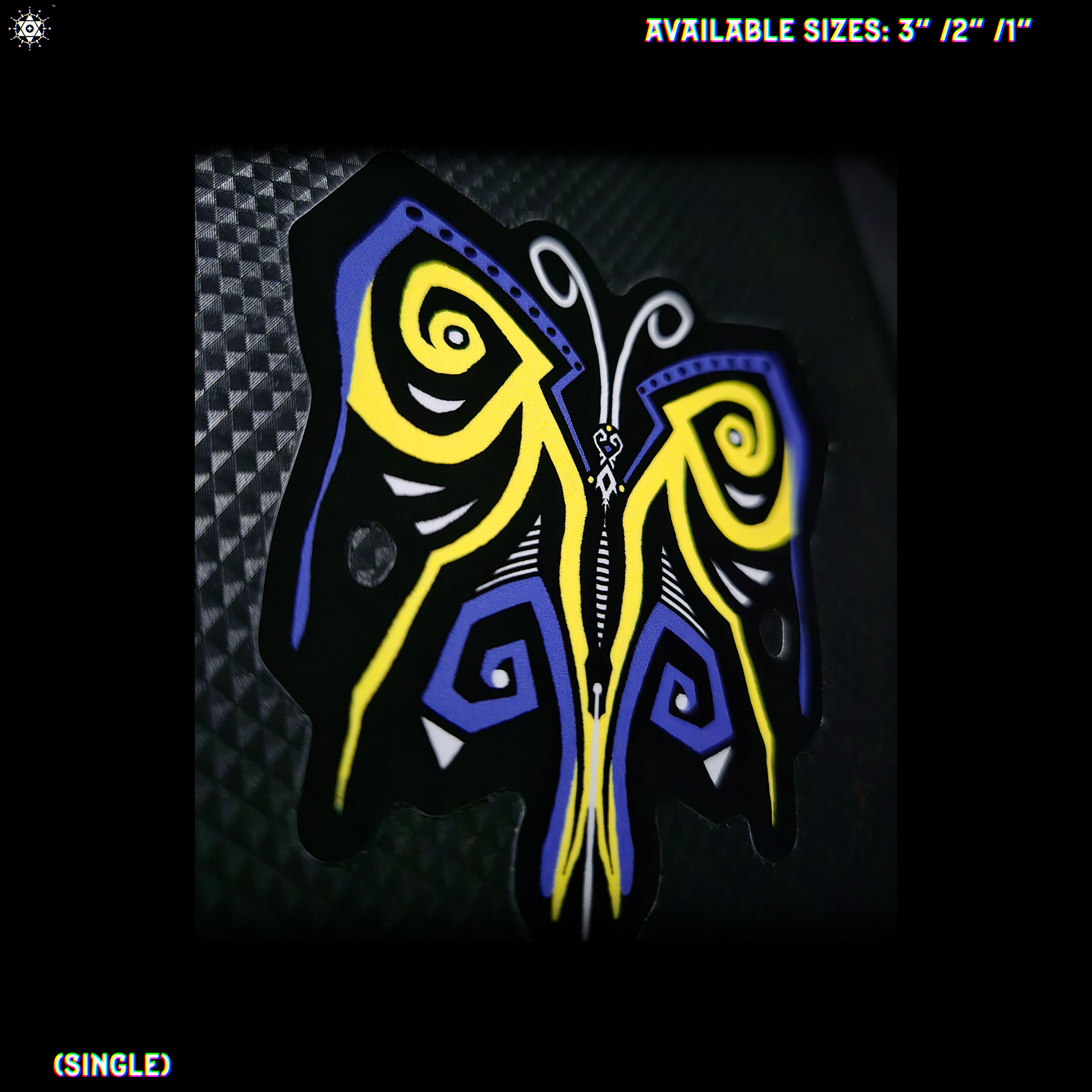 Decorative butterfly design with blue, black, white and yellow colors, stuck onto a textured black background.