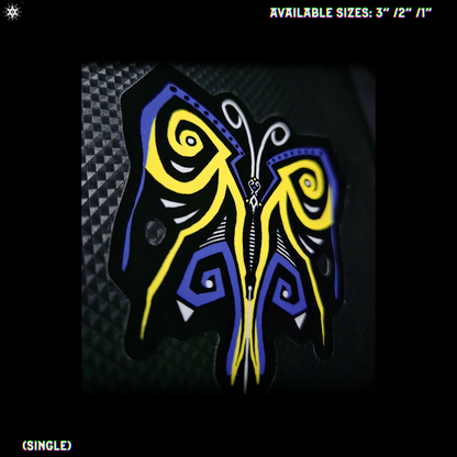 Decorative butterfly design with blue, black, white and yellow colors, stuck onto a textured black background.