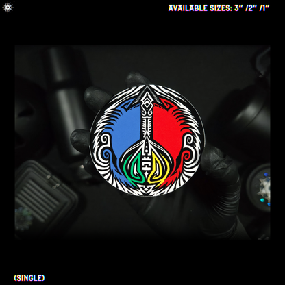 Hand holding a sticker with a peace design.